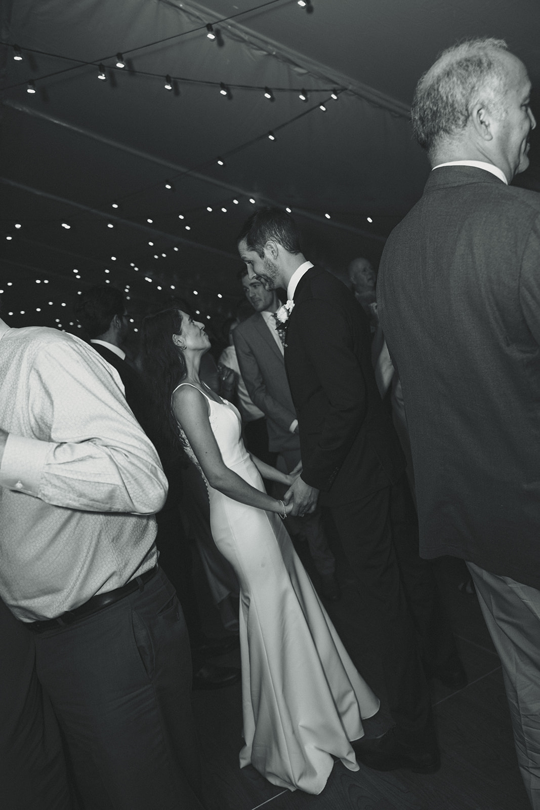 Bride and Groom Candid during wedding reception in Sunken Gardens St.Petersburg. Florida Wedding Photographer