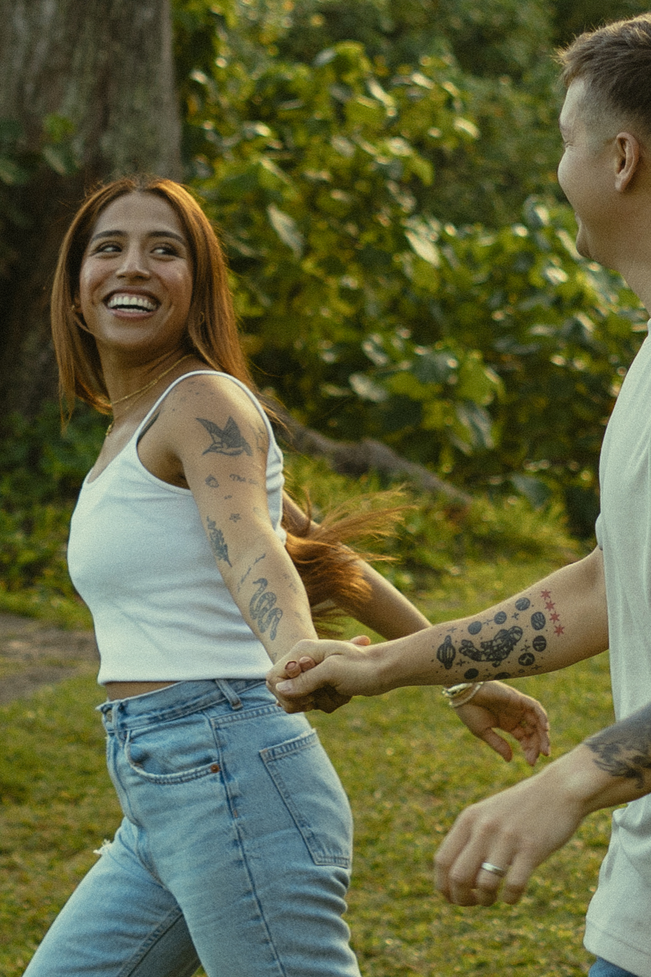 Lush Lakeside Mountains Oahu Hawaii Engagement Pictures Running Couple North Shore