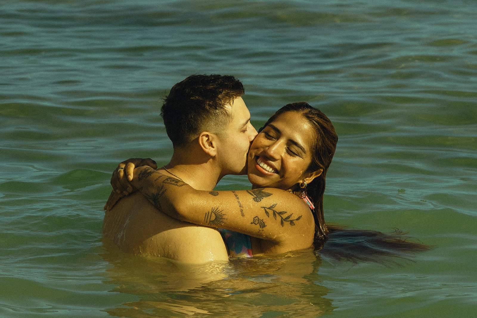 Backdrop Beach North Shore Oahu Hawaii Adventure Kissing Couple Pictures