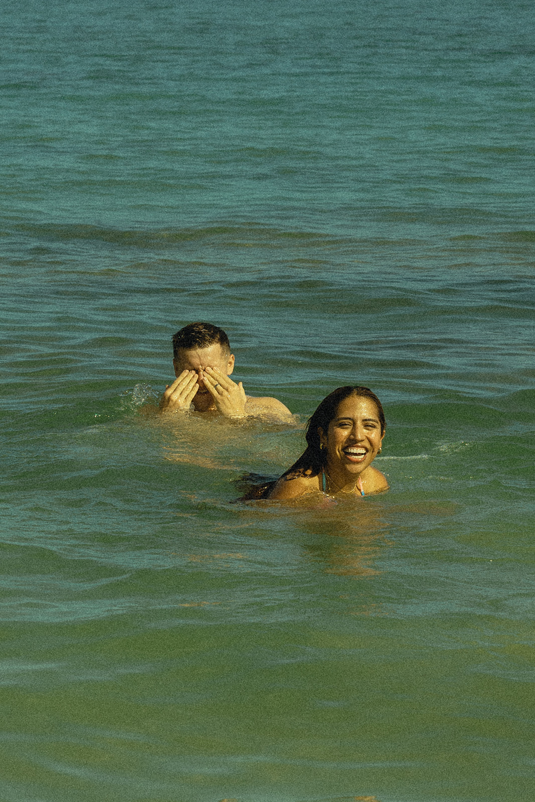 Backdrop Laughing in Beach North Shore Oahu Hawaii Adventure Couple Pictures