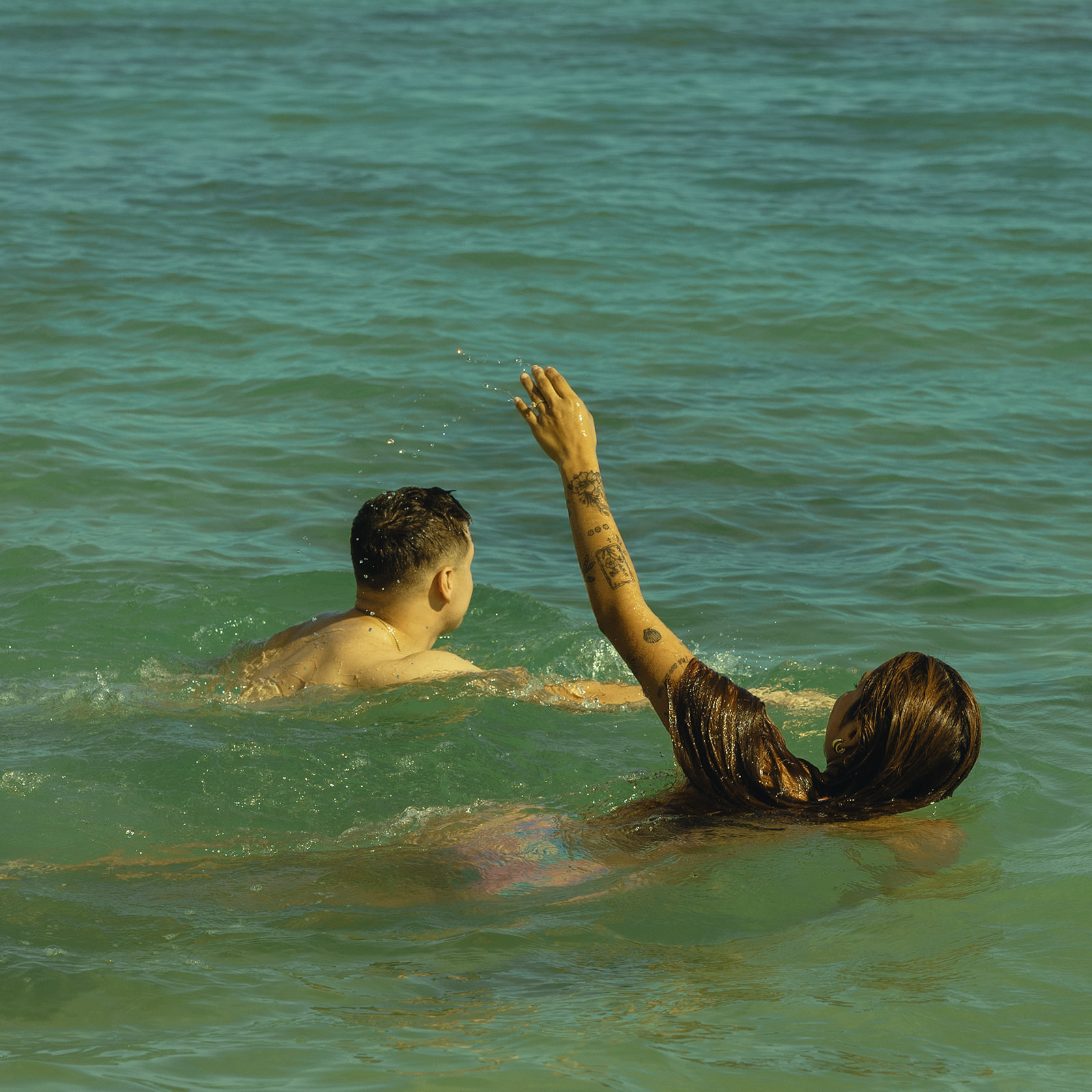 Backdrop Swimming in Beach North Shore Oahu Hawaii Adventure Couple Pictures