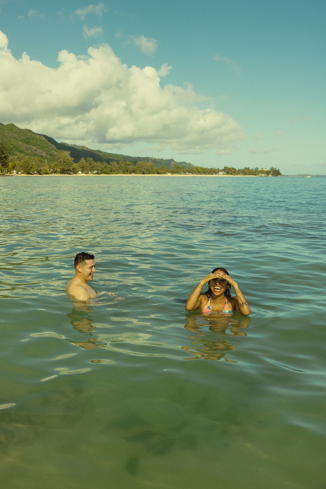 Backdrop Swimming in Beach North Shore Oahu Hawaii Adventure Couple Pictures