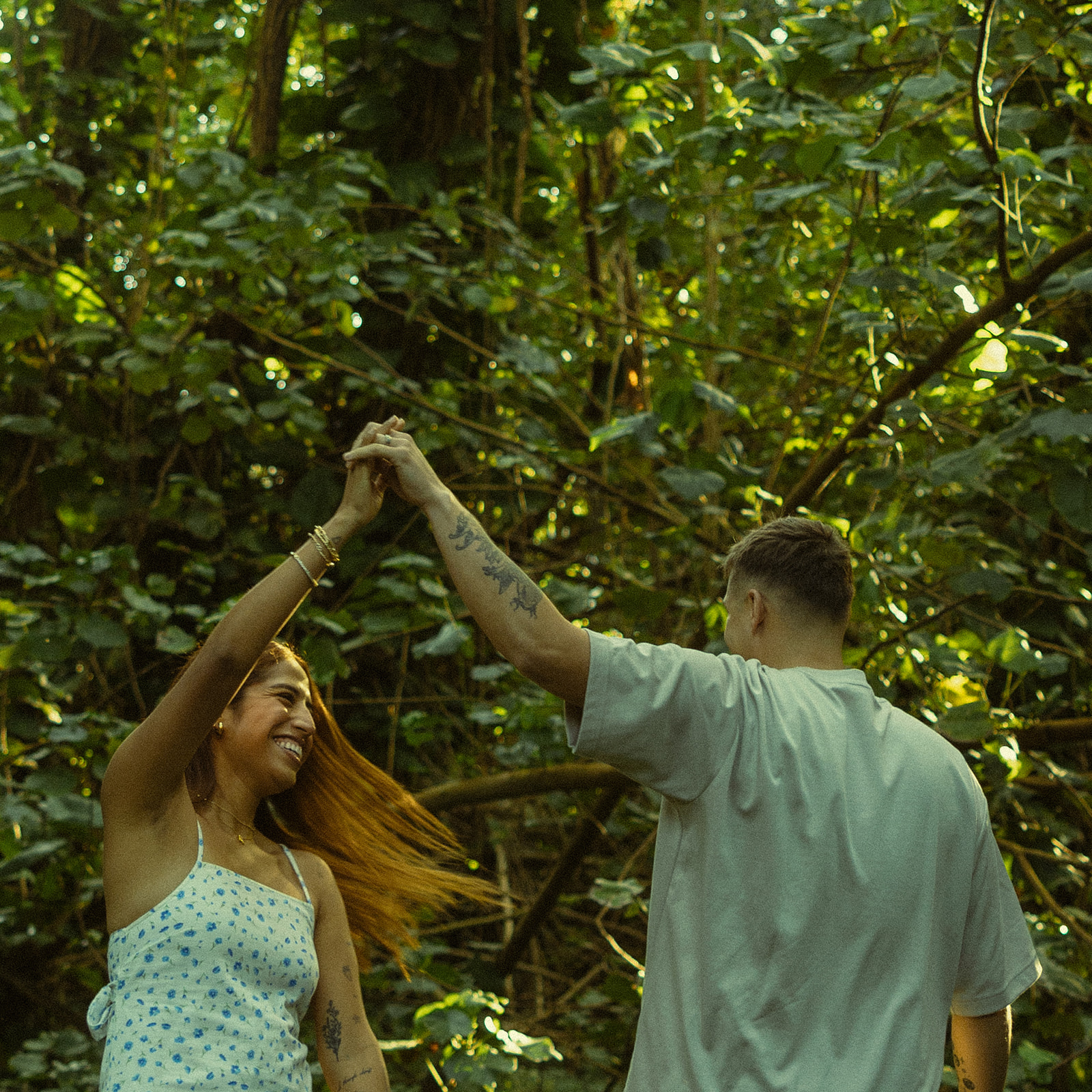 Lush Forest Oahu Hawaii Engagement Pictures Dancing Couple North Shore