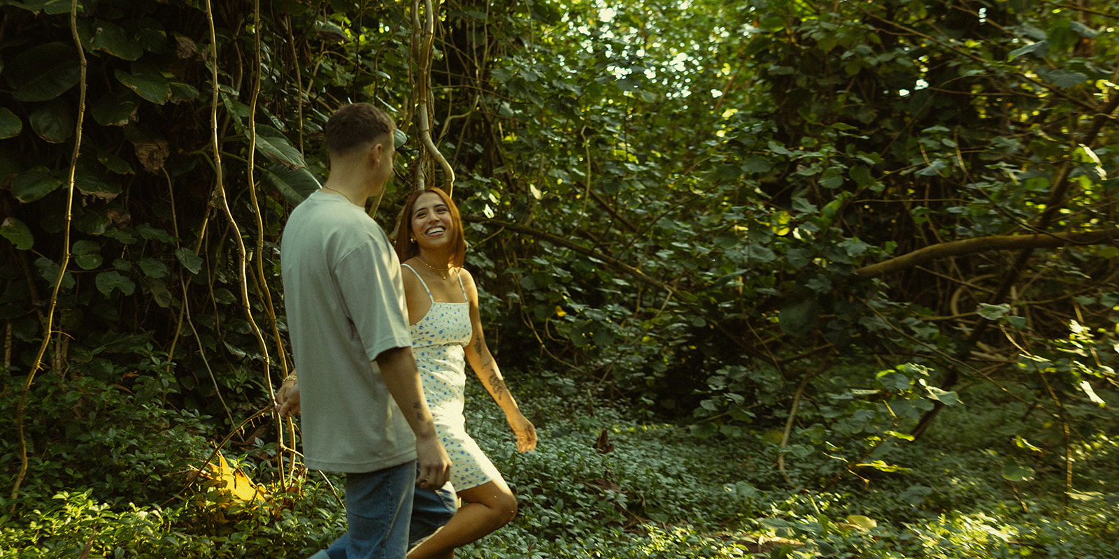 Lush Forest Oahu Hawaii Engagement Pictures Kissing Couple North Shore