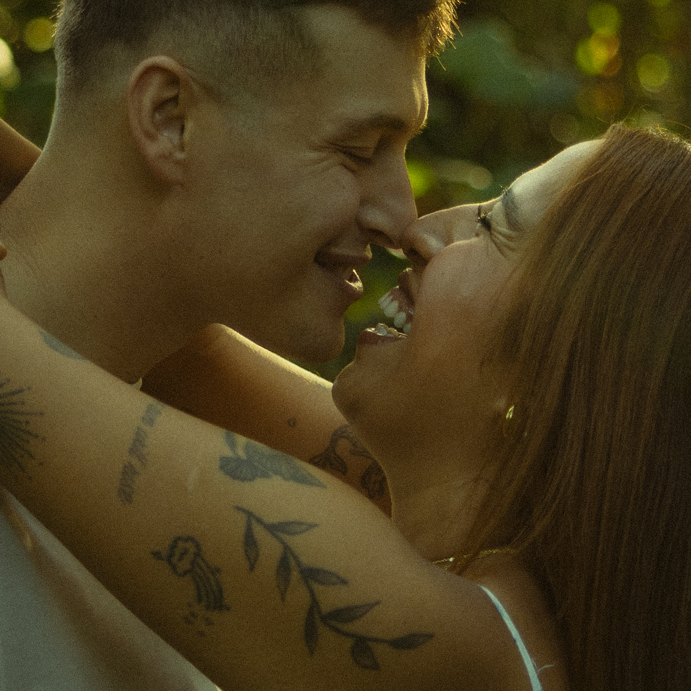 Lush Forest Oahu Hawaii Engagement Pictures Hugging and Dancing Couple North Shore