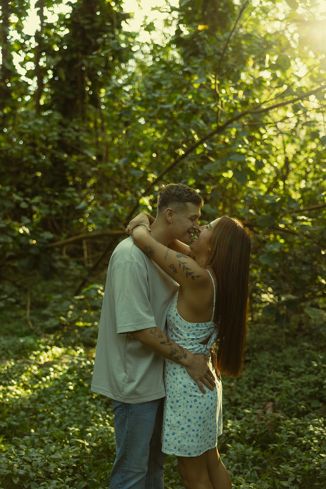 Lush Forest Oahu Hawaii Engagement Pictures Dancing Couple North Shore