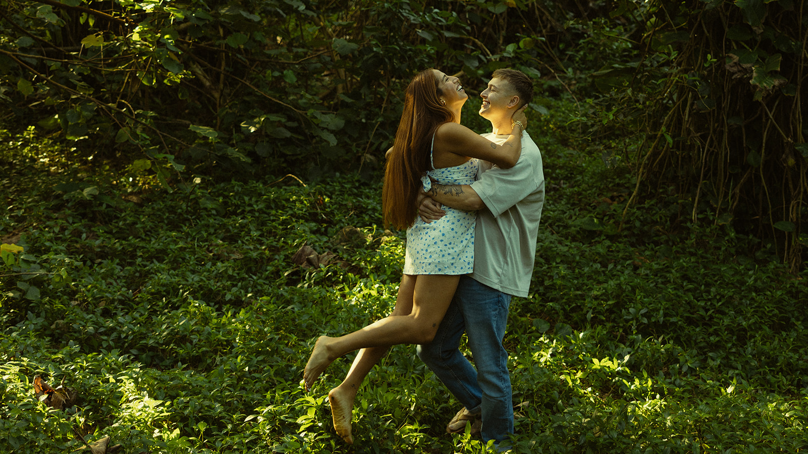 Lush Forest Oahu Hawaii Engagement Pictures Twirling Couple North Shore