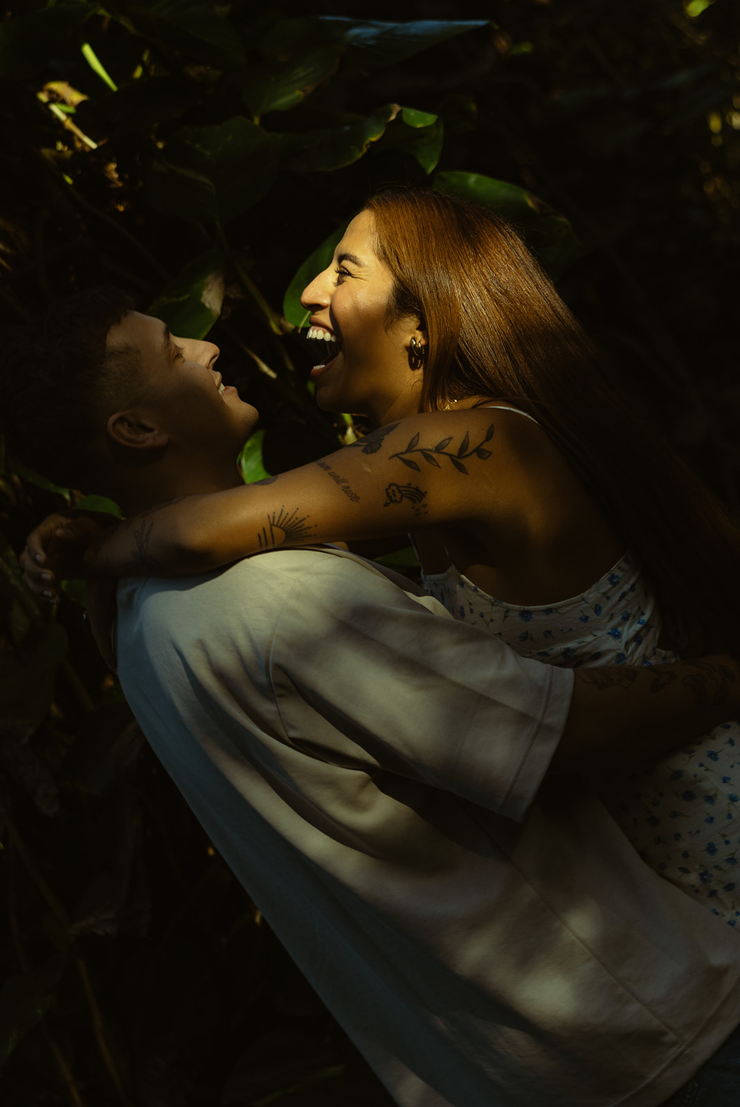 Lush Forest Oahu Hawaii Engagement Pictures Laughing Couple North Shore