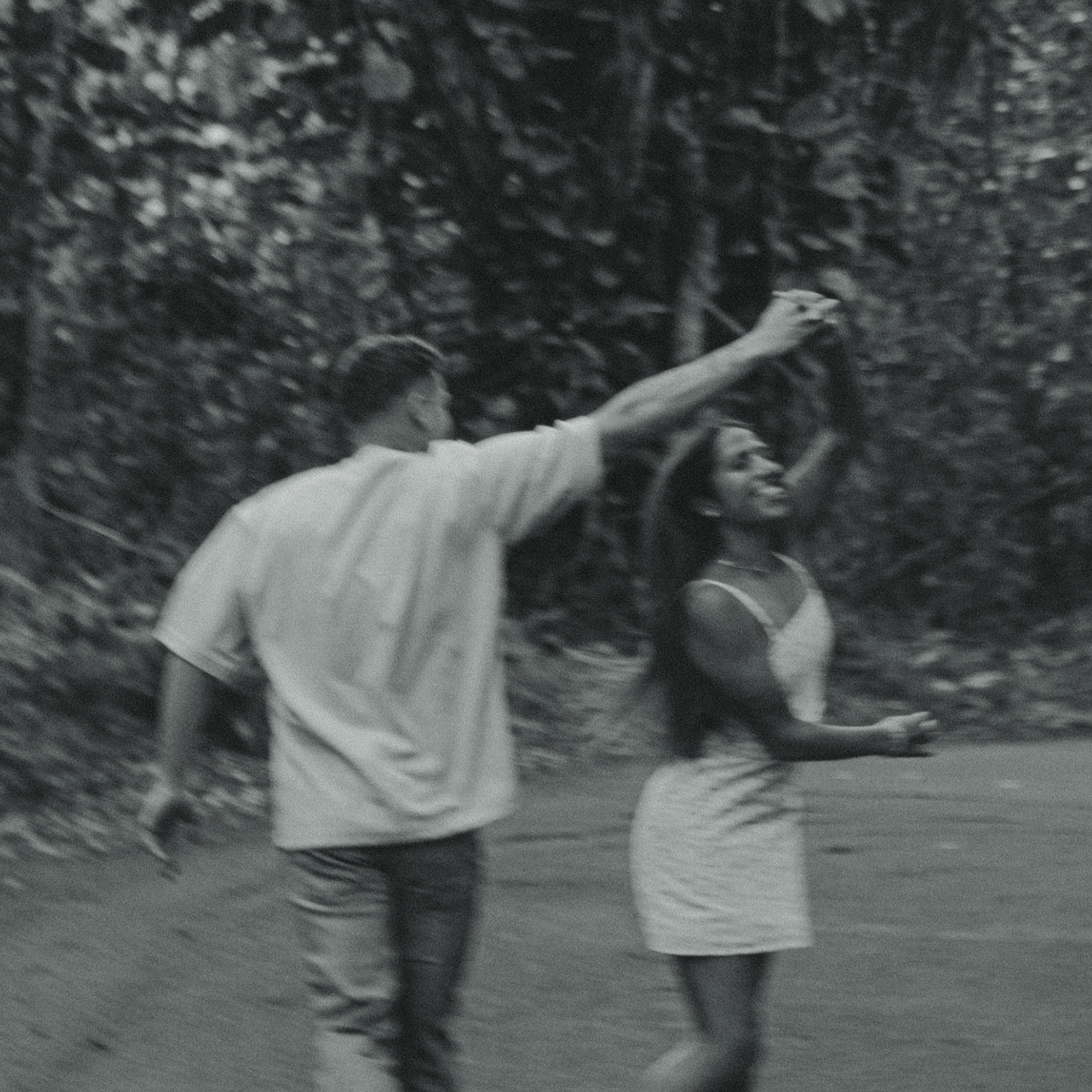 Lush Forest Oahu Hawaii Engagement Pictures Dancing Couple North Shore