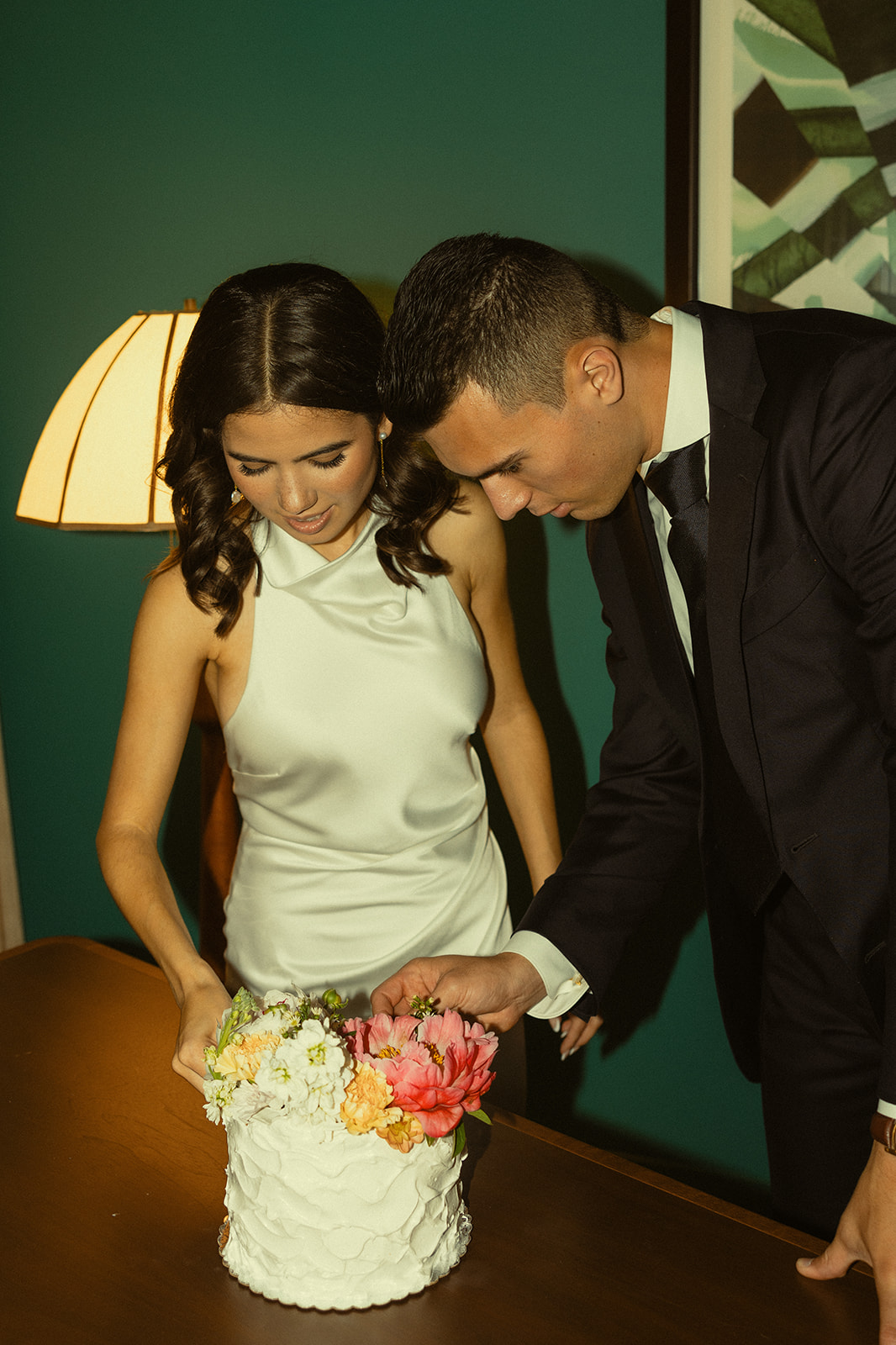 Bride and Groom Hotel Room Cake Cutting Bed Wedding Portraits at Coconut Grove Wedding