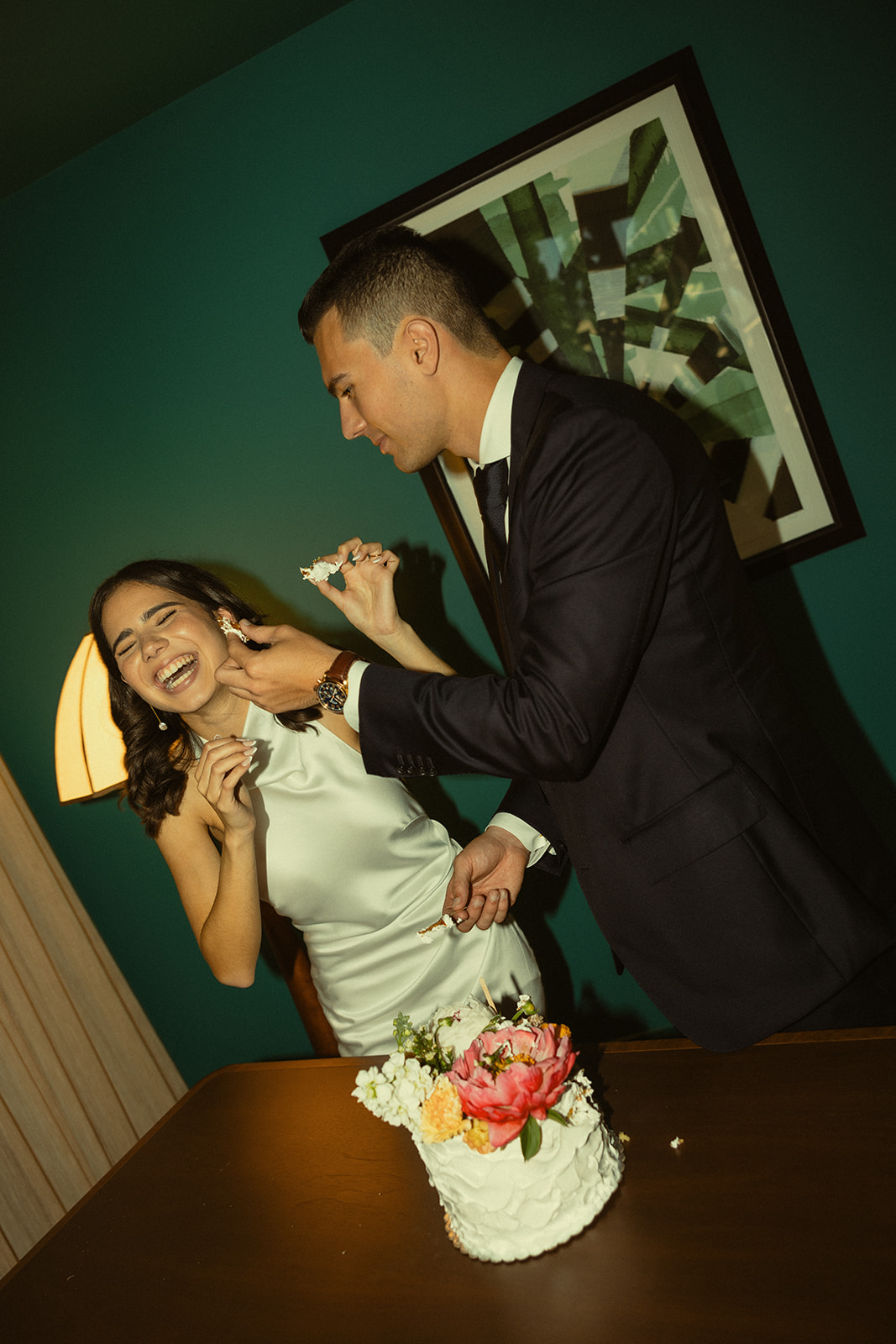 Bride and Groom Hotel Room Cake Cutting Bed Wedding Portraits at Coconut Grove Wedding