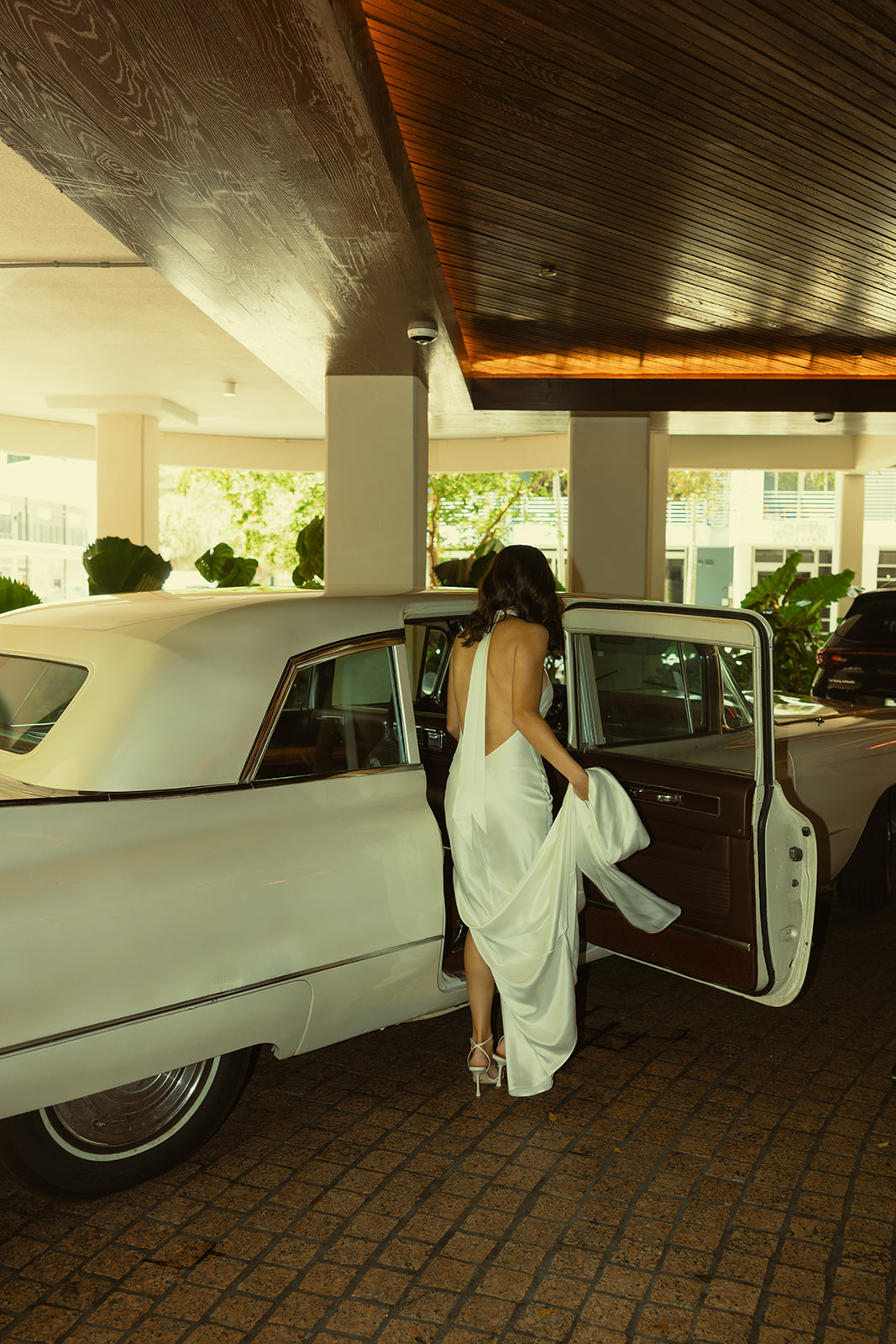 Documentary Wedding Bride Getting in Vintage Cadillac Car