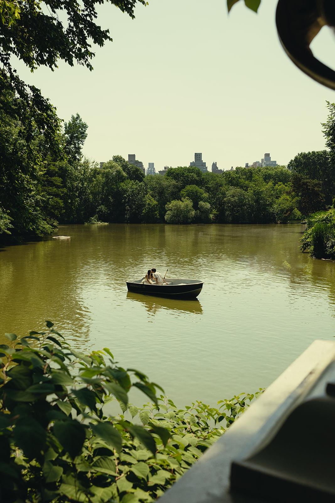 Central Park New York Engagement Session in Canoe Couples Photos