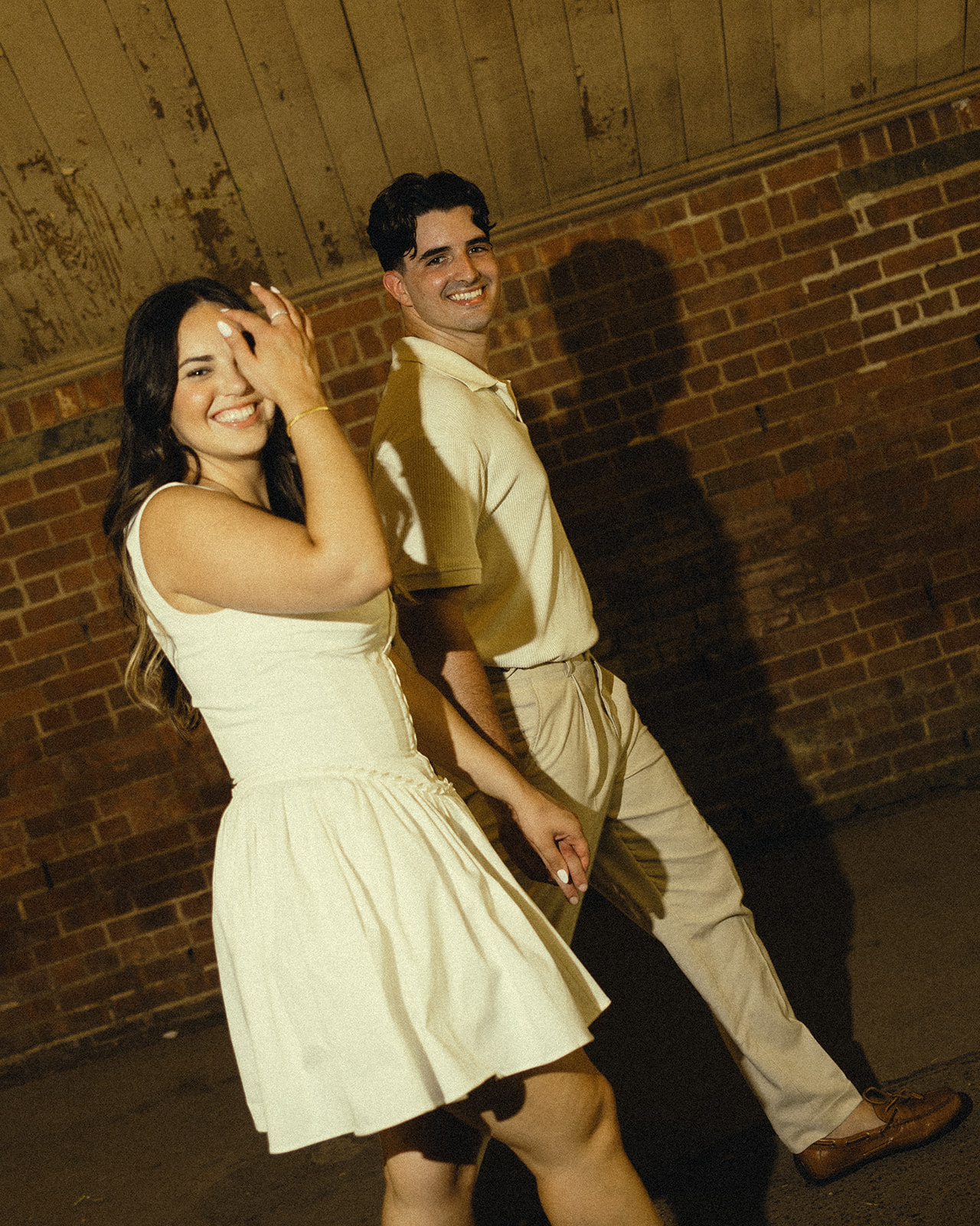 Playful Engagement Photos in Central Park, New York City, New York of Laughing Couple