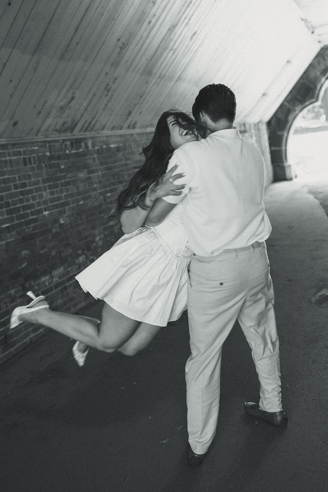 Fall Playful Engagement Photos in Central Park New York City, New York. Fun documentary laughing couples